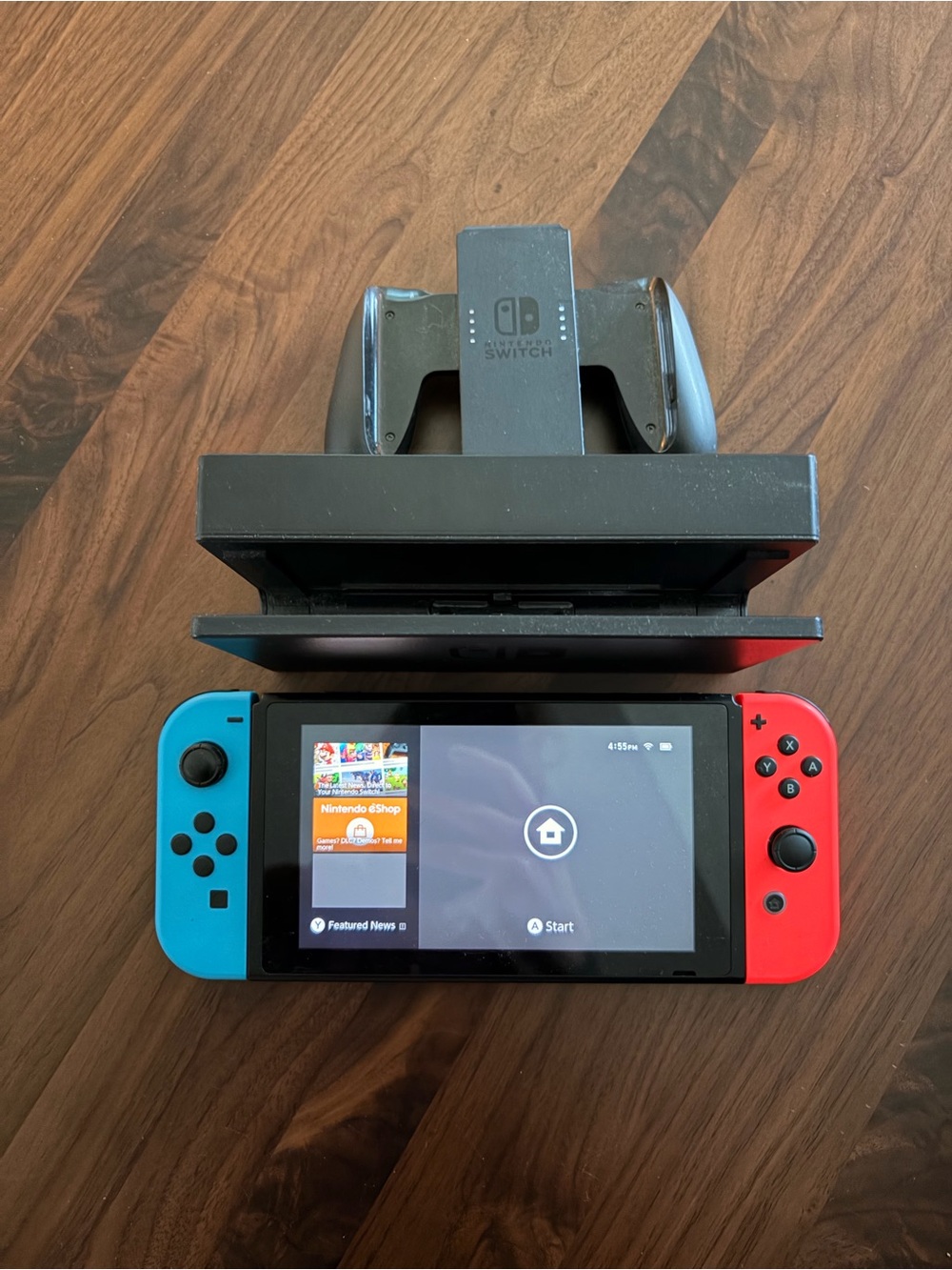 Nintendo Switch with Neon Blue Left Joy‑Con & Neon Red Right Joy‑Con